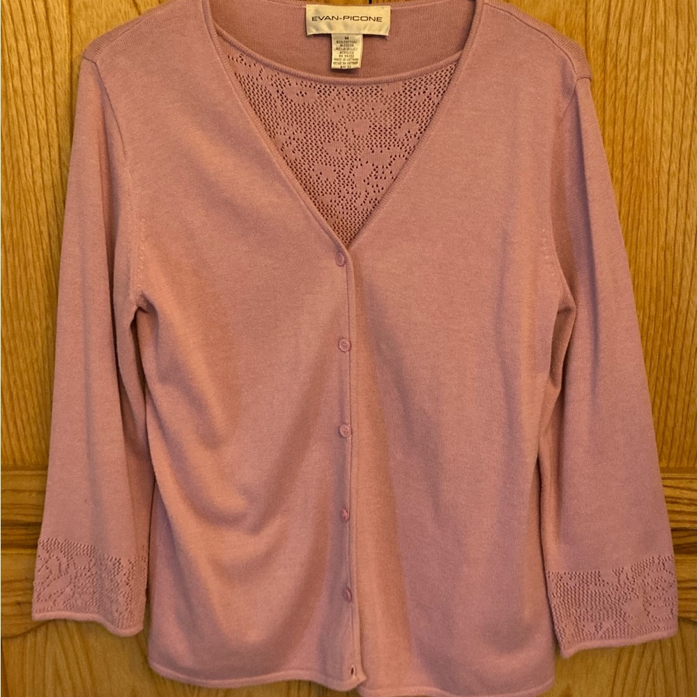 Sweater with attached shirt.